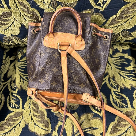 authentic louis vuitton montsouris mini backpack monogram m51137 PM trend silhouette of this montsouris mini backpack is made from monogram coated canvas on a cowhide LOUIS VUITTON Montsouris PM Backpack